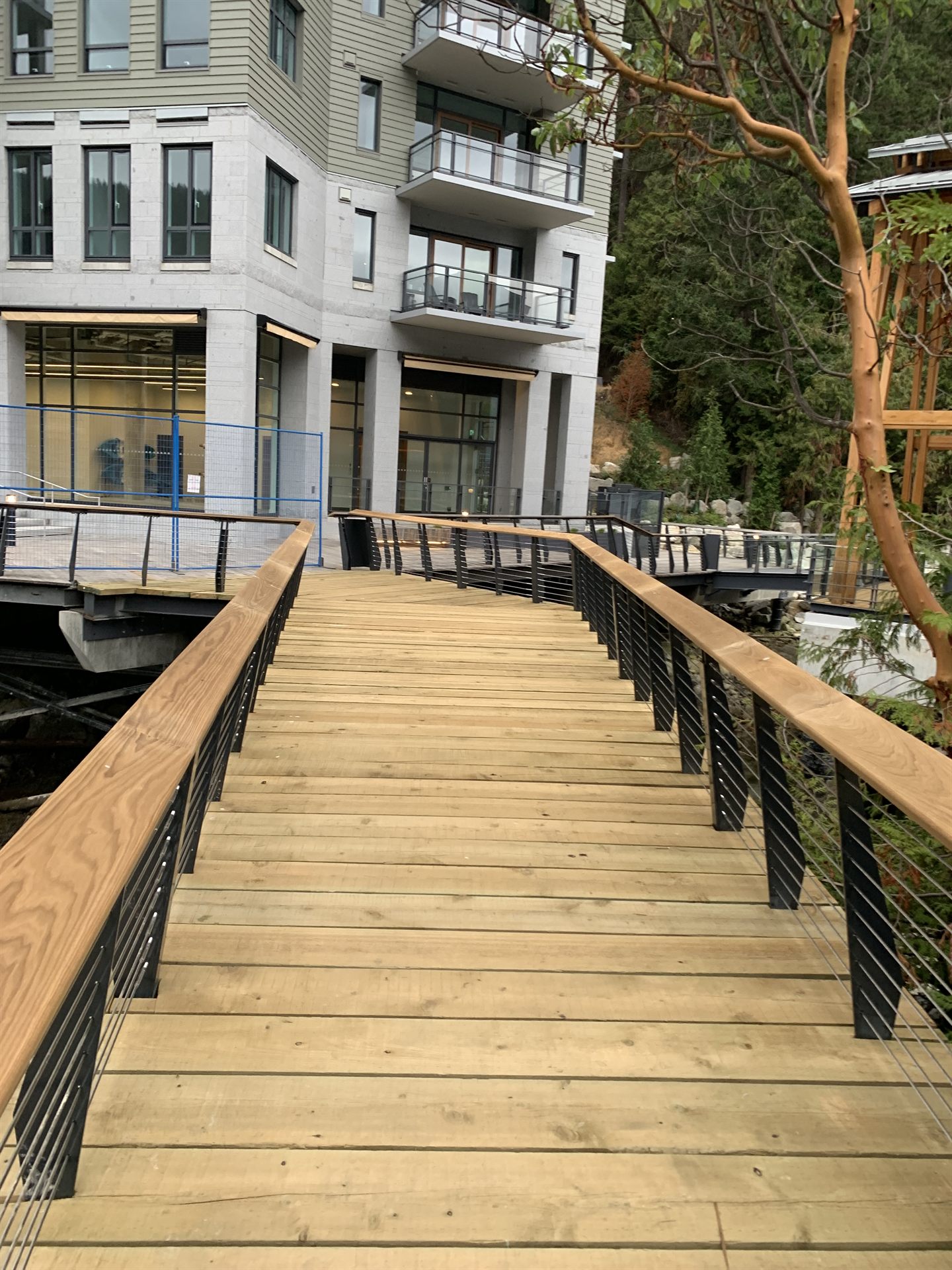 Steel cable railing on a multi-residence deck